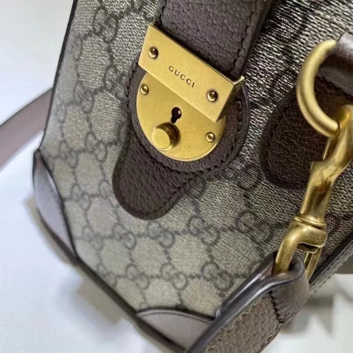 c65ccb992e148f96 Gucci Small Ophidia GG Web Duffle Bag
