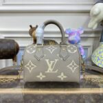 Replica Louis Vuitton Speedy Bandouliere 20 Milk Beige - high-quality designer bag dupe