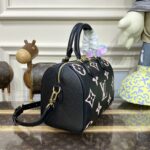 20230404_i1680606883_1271_2.jpg Replica Louis Vuitton Speedy Bandouliere 25 Black – Pink - affordable luxury replica bag