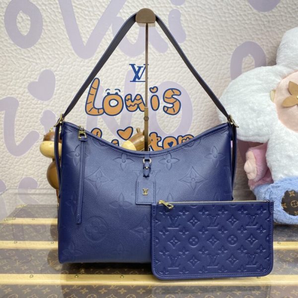 Replica Louis Vuitton Carry All MM Donkerblauw