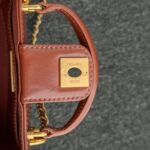 CHANEL Mini Bag with Top Handle - affordable luxury replica bag