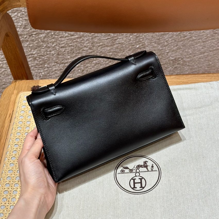 hermes-kelly-pochette-swift-black-gallery-1