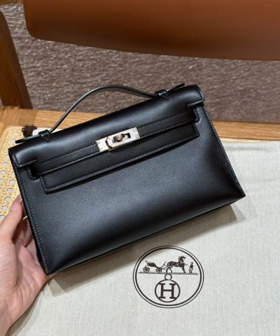 Replica Hermès Kelly Pochette Swift Black - affordable luxury replica bag