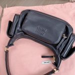 miu-miu-nappa-pocket-bag-black-gallery-7