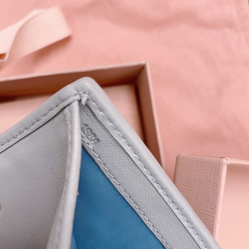 miu-miu-pocket-wallet-light-blue-gallery-3