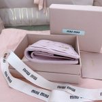 miu-miu-pocket-wallet-pink-gallery-1