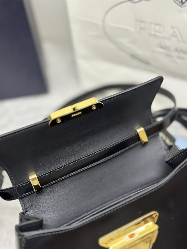 prada-triangle-leather-handbag-black-gallery-1