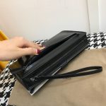 bottega veneta clutch black 2 Bottega Veneta Clutch Black - side angle